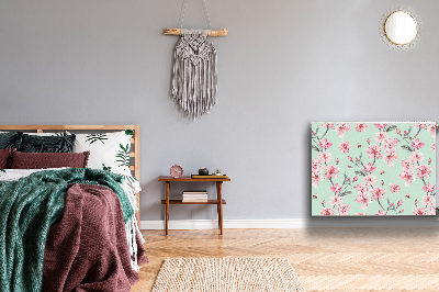 Un tapis avec un imprimé radiateur Fleurs de cerisier