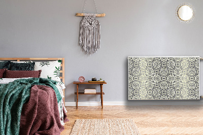 Un tapis avec un imprimé radiateur Motif floral