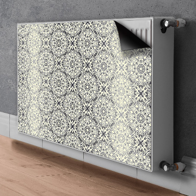 Un tapis avec un imprimé radiateur Motif floral