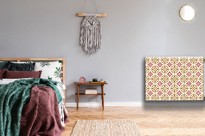 Un tapis avec un imprimé radiateur Motif floral