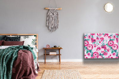 Un tapis avec un imprimé radiateur Fleurs