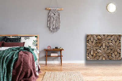 Un tapis avec un imprimé radiateur Motif en bois floral