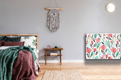 Un tapis avec un imprimé radiateur Fleurs rouges