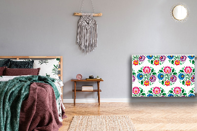 Un tapis avec un imprimé radiateur Fleurs de style folklorique