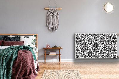 Un tapis avec un imprimé radiateur Motif floral