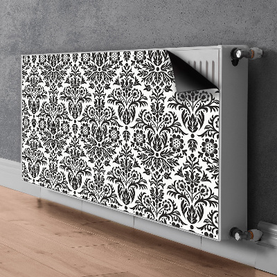 Un tapis avec un imprimé radiateur Motif floral