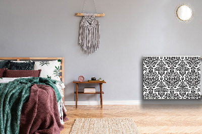 Un tapis avec un imprimé radiateur Motif floral