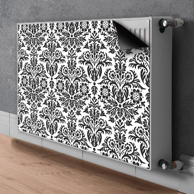 Un tapis avec un imprimé radiateur Motif floral