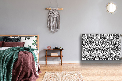 Un tapis avec un imprimé radiateur Motif floral