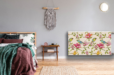 Un tapis avec un imprimé radiateur Fleurs et oiseaux