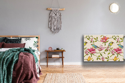 Un tapis avec un imprimé radiateur Fleurs et oiseaux