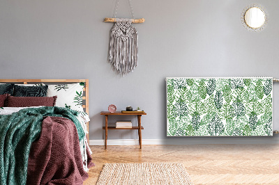 Un tapis avec un imprimé radiateur Feuilles de forêt