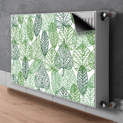 Un tapis avec un imprimé radiateur Feuilles de forêt