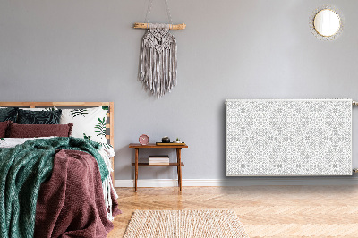 Un tapis avec un imprimé radiateur Ornement floral