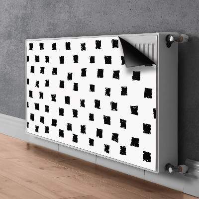 Un tapis avec un imprimé radiateur Carrés peints