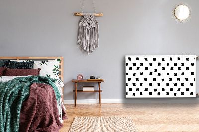 Un tapis avec un imprimé radiateur Carrés peints