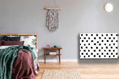 Un tapis avec un imprimé radiateur Carrés peints