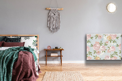 Un tapis avec un imprimé radiateur Fleurs aquarelles