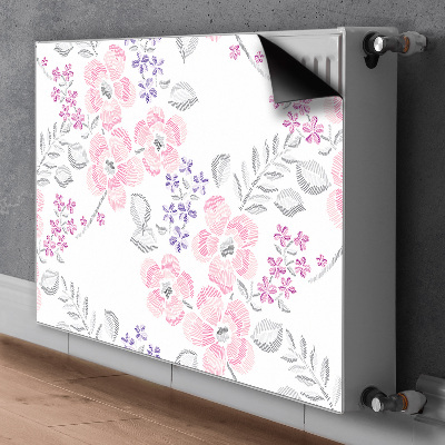 Un tapis avec un imprimé radiateur Motif floral
