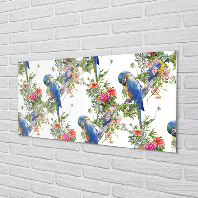 Tableaux sur verre acrylique Les oiseaux sur une branche avec des fleurs