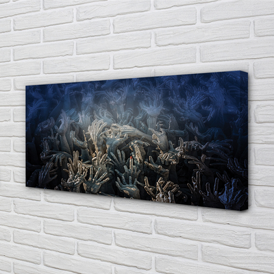 Tableaux sur toile canvas Mains lumière bleue