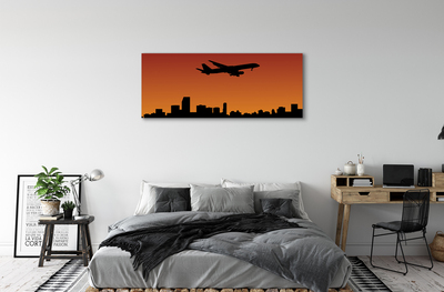 Tableaux sur toile canvas Avion ciel et le coucher du soleil