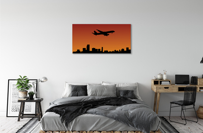 Tableaux sur toile canvas Avion ciel et le coucher du soleil