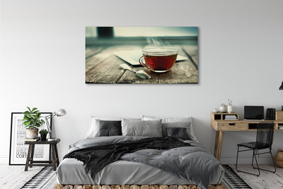 Tableaux sur toile canvas Faire chauffer une cuillère à café de thé