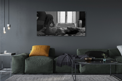 Tableaux sur toile canvas Femme couchée sur la fenêtre de visualisation