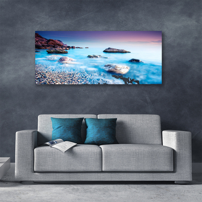 Tableaux sur toile Mer pierres plage paysage bleu gris rose