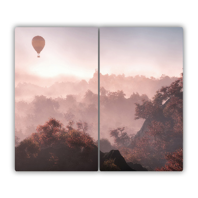 Protège plaque à induction Ballon au-dessus de la forêt