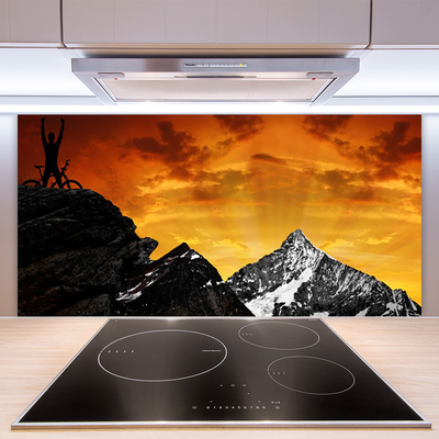 Crédence de cuisine en verre Montagnes paysage orange gris noir