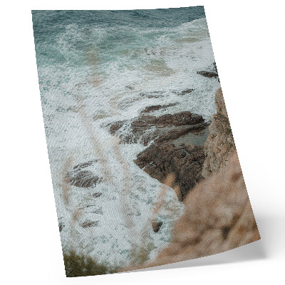 Impression sur toile Vagues de la mer et rivage rocheux aux tons turquoise