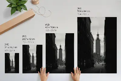 Décoration murale rue en noir et blanc avec une tour monumentale au centre