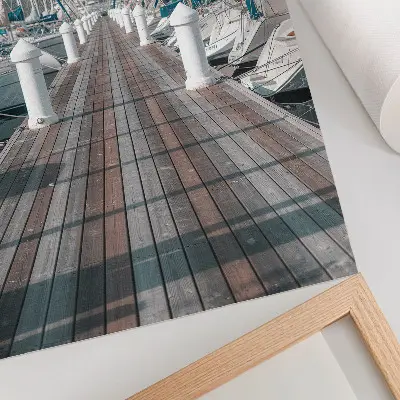 Impression sur toile représentant une symétrie de yachts dans une marina sous un ciel bleu