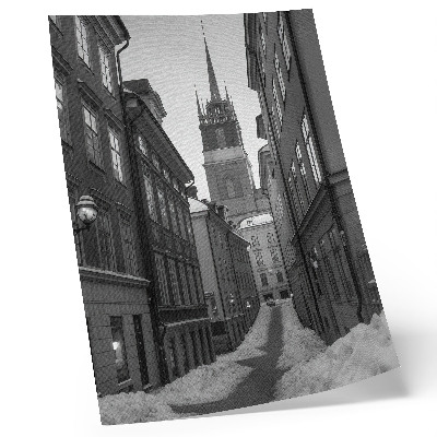 Impression sur toile Une rue étroite avec la cathédrale en arrière-plan