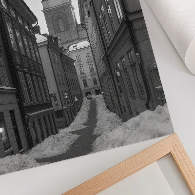 Impression sur toile Une rue étroite avec la cathédrale en arrière-plan