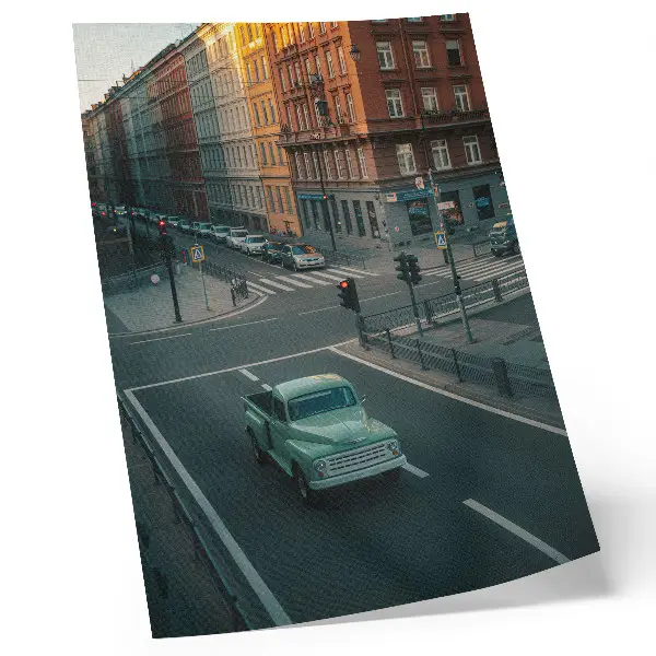 Impression sur toile immeubles de rapport avec voiture rétro dans une ambiance de coucher de soleil
