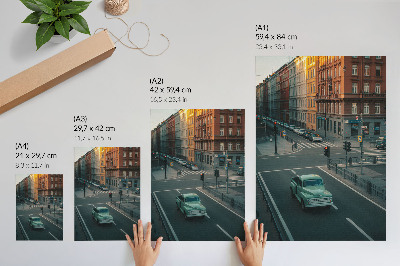 Impression sur toile Immeubles de rapport, voiture rétro, ambiance coucher de soleil