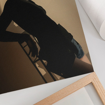 Décoration murale Silhouette sombre d'une femme, un rayon de lumière, la paix