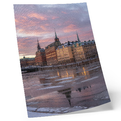 Impression sur toile Panorama urbain au coucher du soleil, fragments de glace
