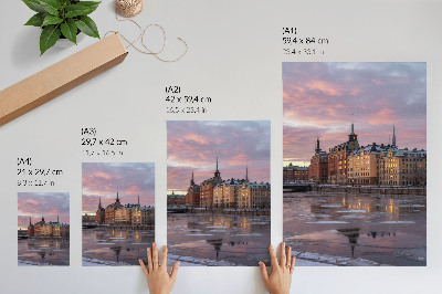 Impression sur toile Panorama urbain au coucher du soleil, fragments de glace
