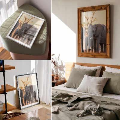 Impression sur toile Des éléphants au coucher du soleil, avec des arbres en arrière-plan.