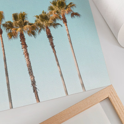 Impression sur toile Palmiers sur fond bleu, paix et nature pendant les vacances