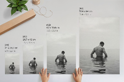 Affiche décorative homme à l'envers sur fond gris dans une eau calme