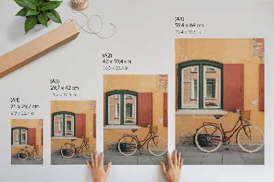 Affiche décorative Un vélo se détachant sur une façade rétro colorée