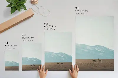 Affiche décorative représentant des antilopes dans un paysage de montagnes paisible