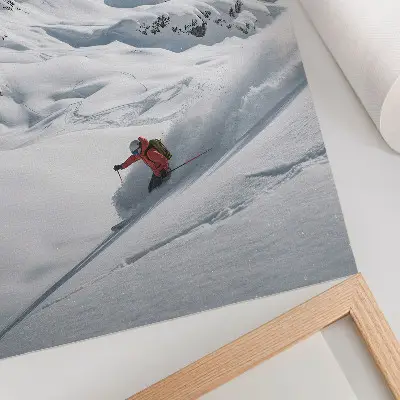 Impression sur toile skieur en action avec montagnes blanches et ciel bleu
