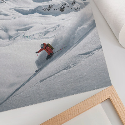 Impression sur toile Skieur en action, montagnes blanches, ciel bleu