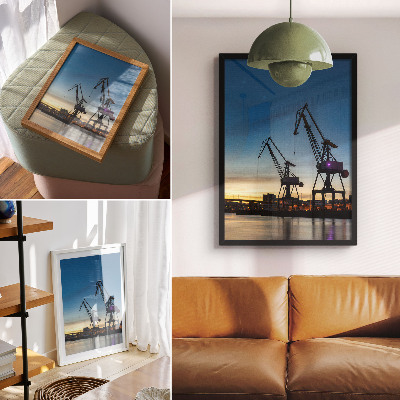 Décoration murale Des grues se détachant sur un coucher de soleil dynamique.
